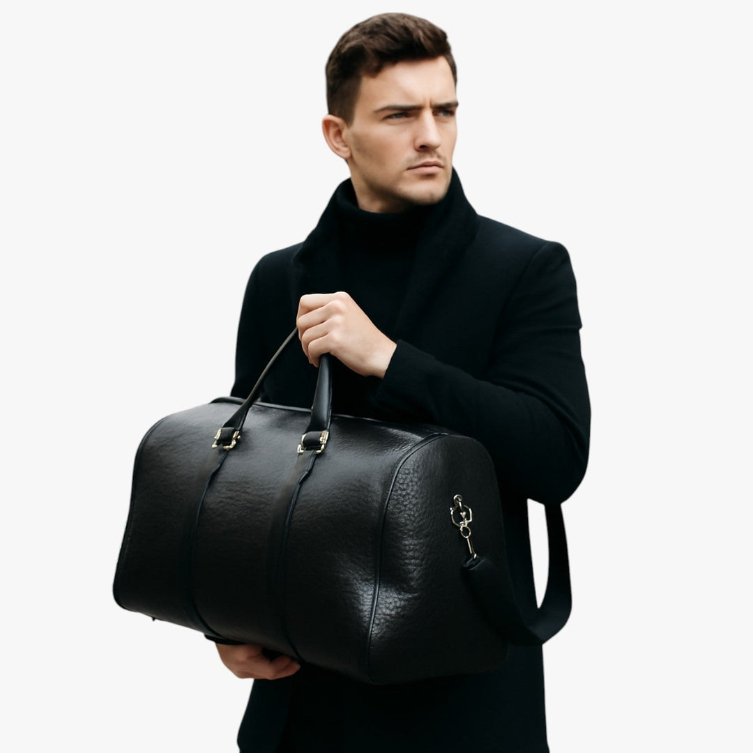 Borsone da viaggio marrone scuro, versatile per uomo/donna, con manici e tracolla. Perfetto per bagaglio a mano.