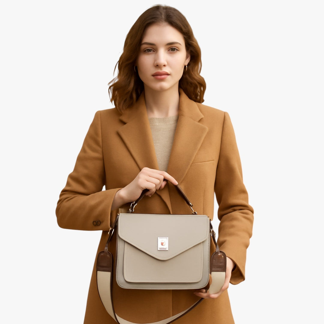 Elegante borsa a mano da donna, design multicolore vivace, ideale per uso quotidiano e viaggi.