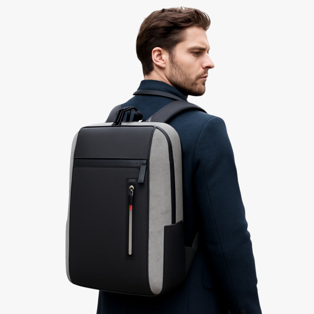 Zaino porta PC 15.6 uomo, ideale per viaggi e ufficio, con scomparti organizzati e design moderno.
