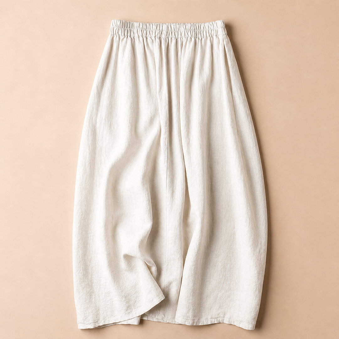 Gonna midi donna con vita elastica e ricami per uno stile elegante-casual. Abbigliamento estivo e versatile.