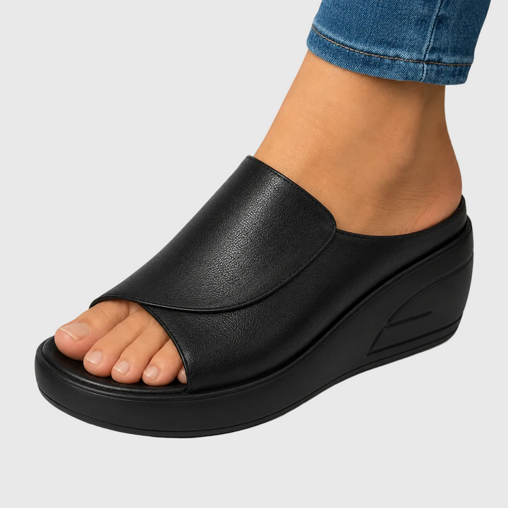 Mules donna con plateau, eleganti e confortevoli, perfette scarpe estive per look casual o chic.