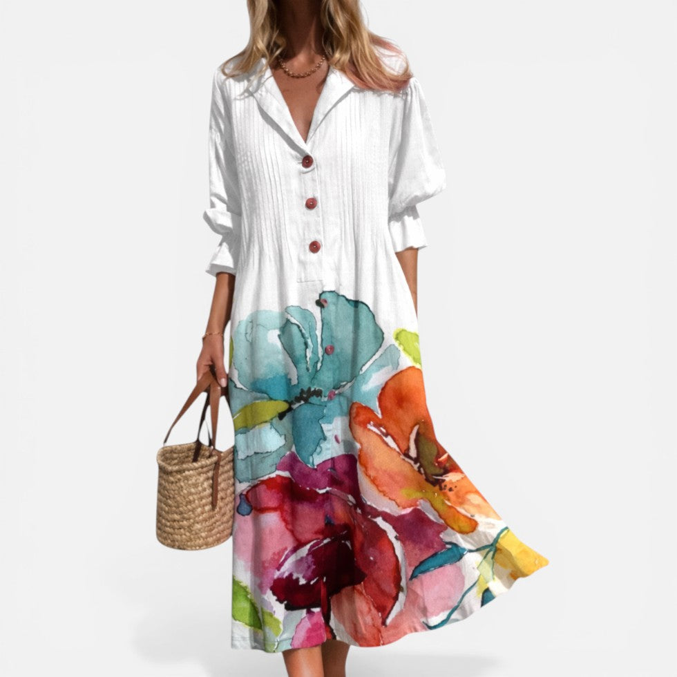 Elegante abito chemisier estivo da donna con stampa vivace, ideale per un look casual e fluido.