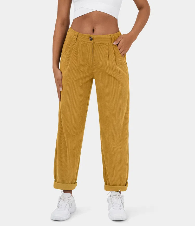 Eleganti pantaloni sartoriali da donna a coste, ideali per un outfit sofisticato e comodo in ufficio.