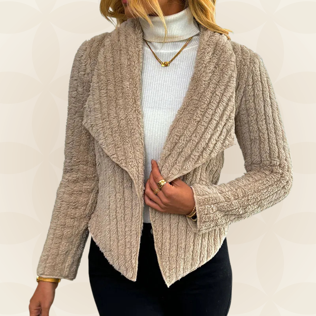 Gilet beige da donna a costine con vestibilità comoda, perfetto per il layering e outfit versatili.