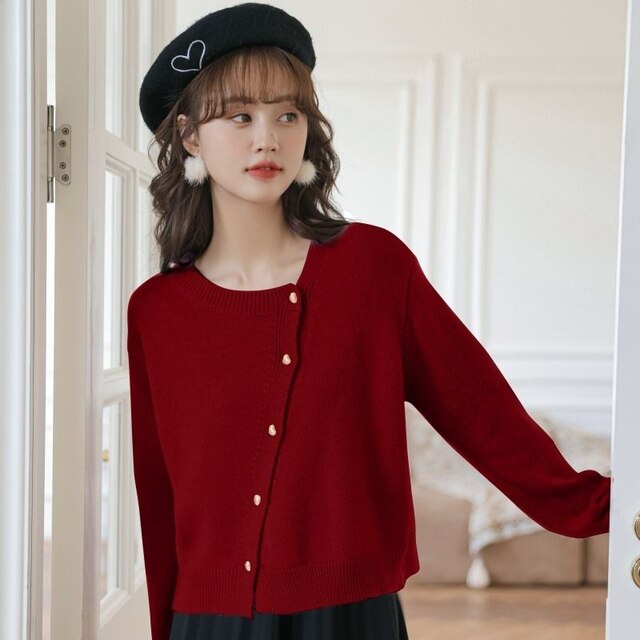 Cardigan gilet donna casual chic con bottoni decorativi, perfetto per abbigliamento versatile autunno-inverno.