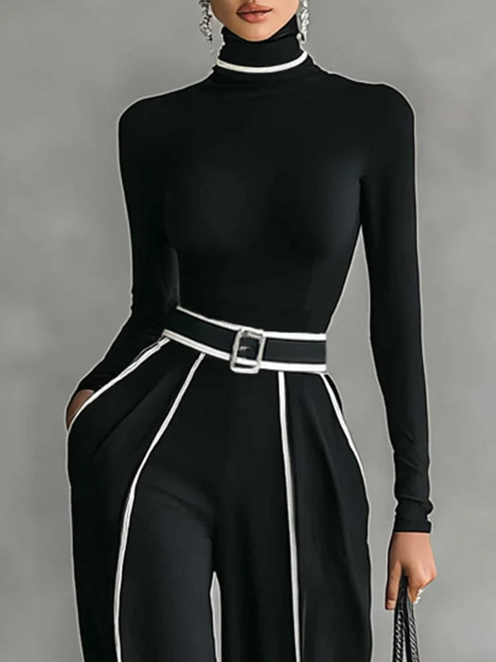 Outfit elegante donna completo due pezzi: dolcevita e pantaloni gamba larga nero. Stile moderno e confortevole.