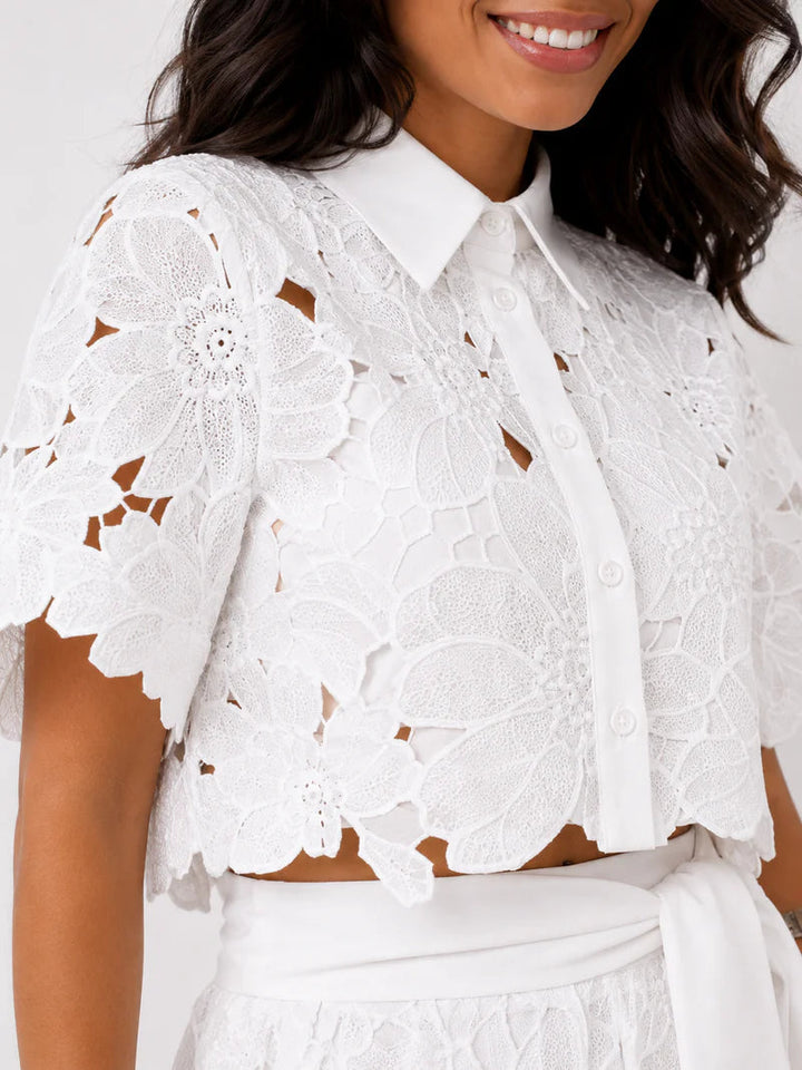 Completo due pezzi donna elegante, con top pizzo e pantalone palazzo. Perfetto per serate primavera estate.