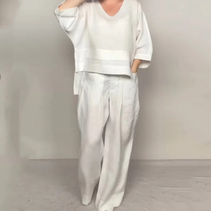 Completo donna primaverile/estivo con top e pantaloni relaxed, dotati di tasche funzionali ed eleganti.