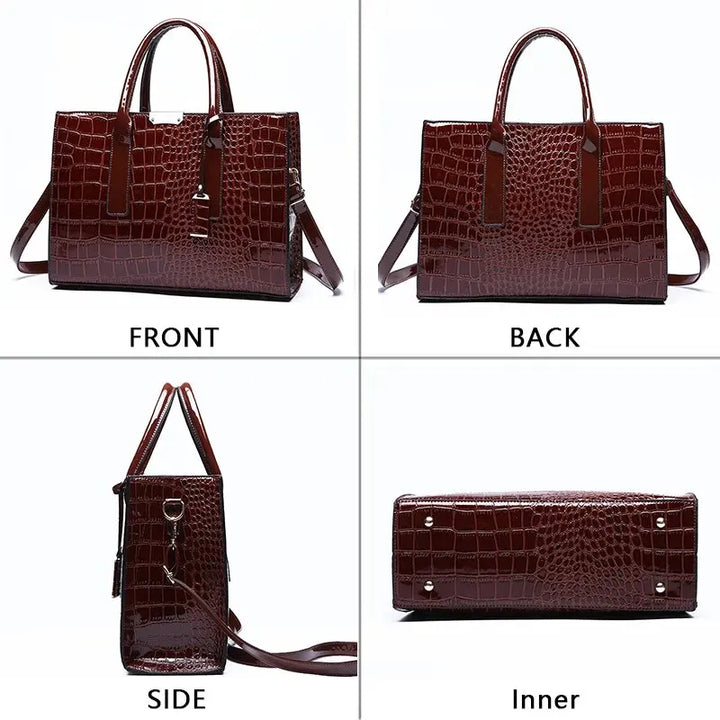 Dettaglio borsa a mano donna in similpelle effetto coccodrillo. Nuova collezione, accessorio elegante e di tendenza per outfit chic.