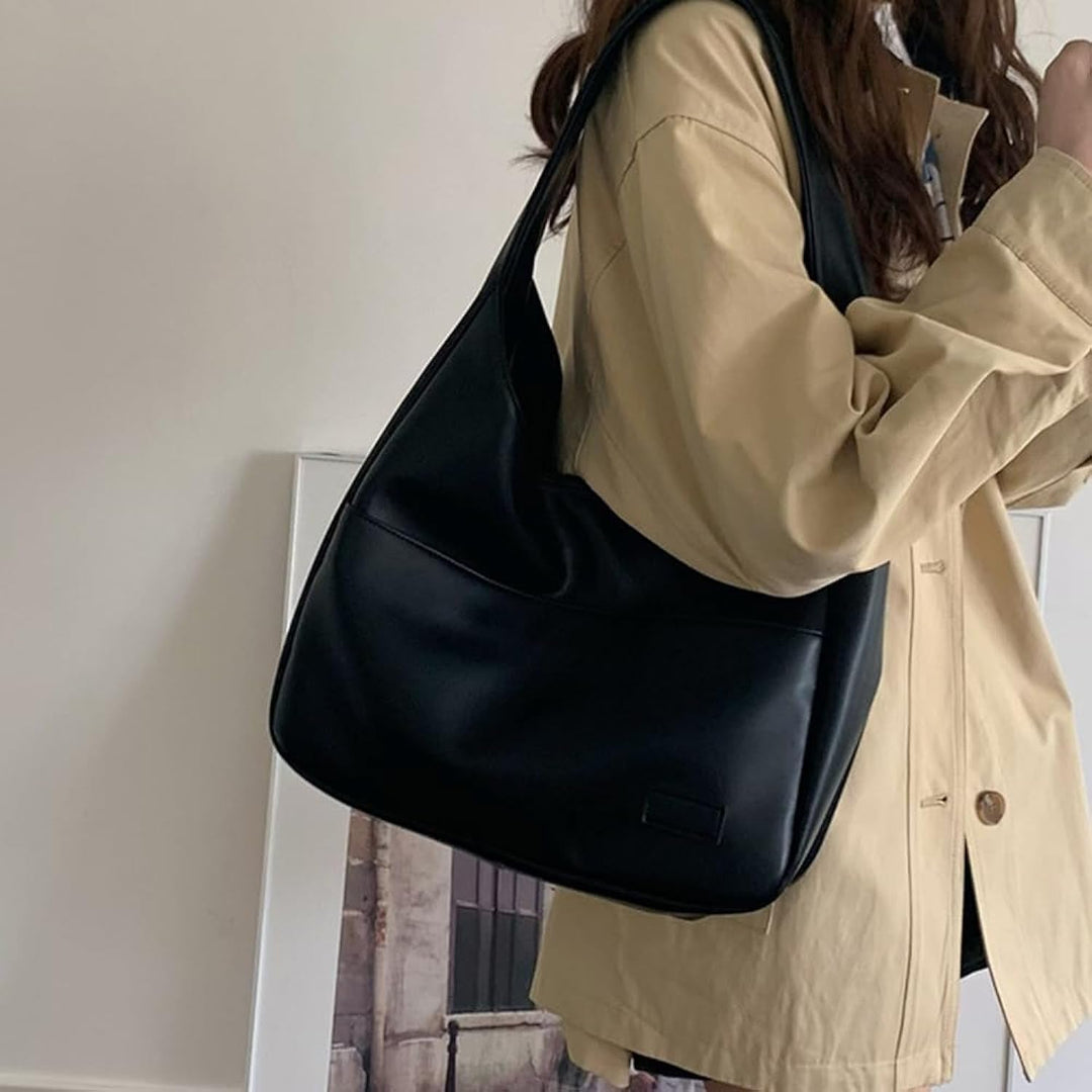 Elegante borsa a tracolla donna, pelle premium, versatile per occasioni formali e casual.