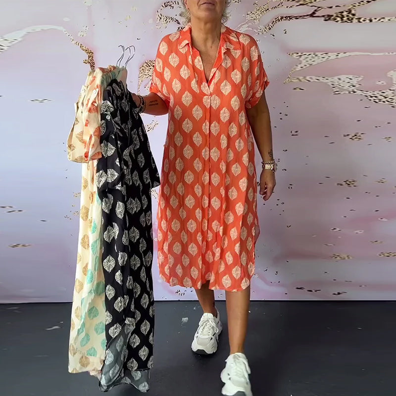 Abito estivo donna midi con scollo a V, comodo e versatile. Disponibile in varie taglie per un'estate alla moda.