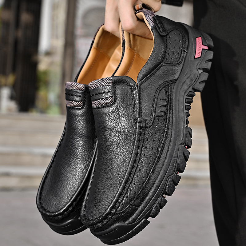 Calzature uomo slip-on nere/arancio: stivali con comfort superiore, supporto arco plantare e aderenza antiscivolo.