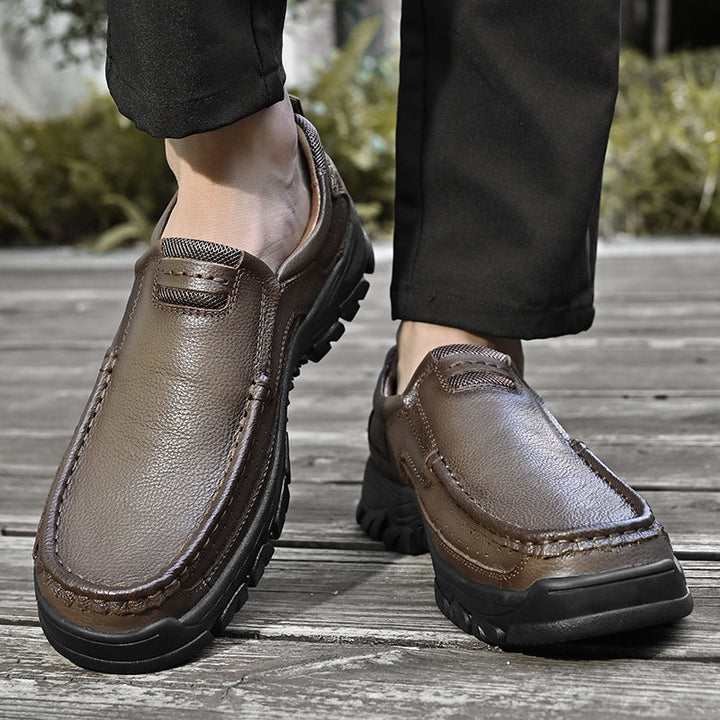 Facili da indossare: stivali uomo slip-on neri/arancio, comfort garantito, supporto arco e suola antiscivolo.