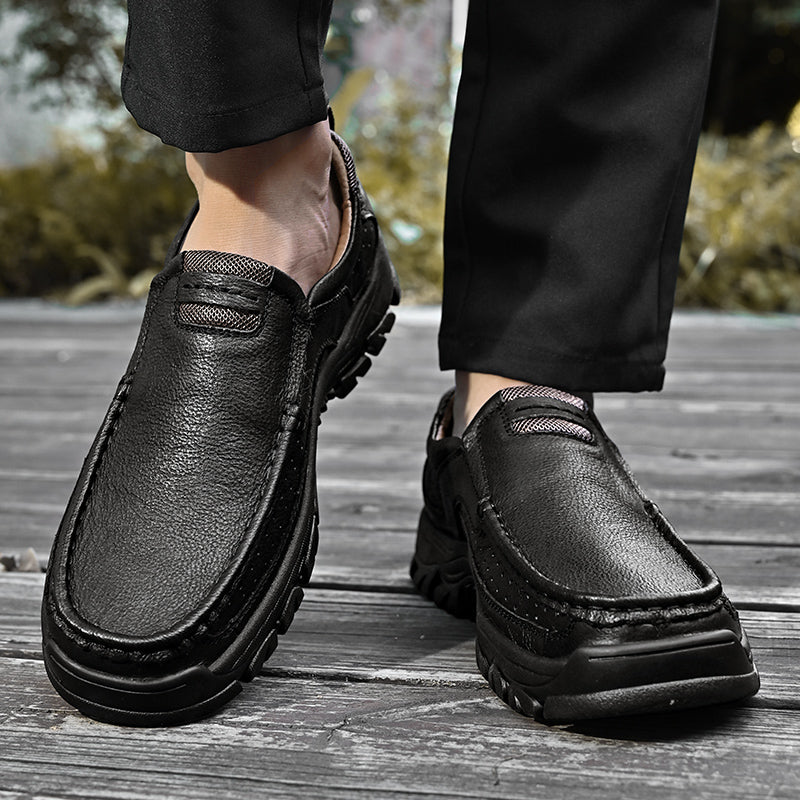 Stivali uomo neri e arancio, slip-on, confortevoli, antiscivolo e con supporto per l'arco plantare.