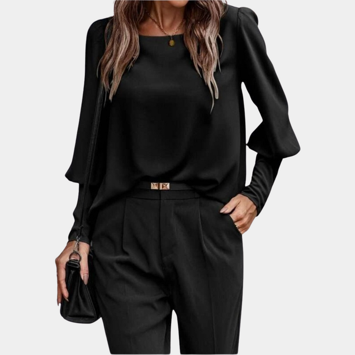 Top donna primaverile, blusa elegante con maniche a palloncino. Ideale per abbigliamento ufficio o look casual chic.