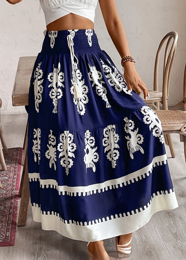 Maxi gonna estiva donna fluida con vivace stampa geometrica, vita arricciata; ideale per il comfort e lo stile estivo.