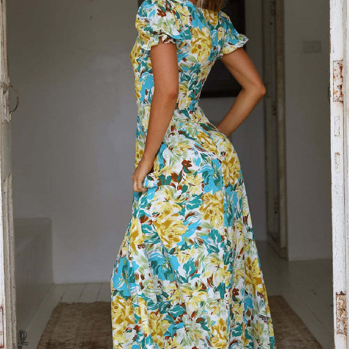 Elegante abito lungo estivo donna verde con stampa floreale e scollo quadrato, dal taglio a linea A, un must-have per l'estate.