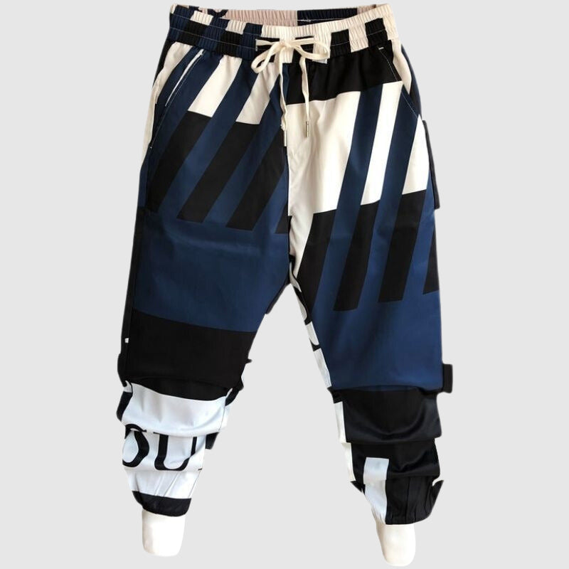 Pantaloni uomo streetwear con vivace stampa graffiti, vita regolabile e polsini, perfetti per l'abbigliamento maschile.