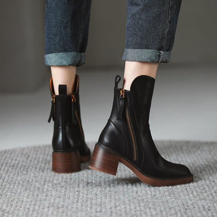 Stivaletti donna neri punta affusolata, tacco alto e suola antiscivolo, calzature chic per autunno-inverno.