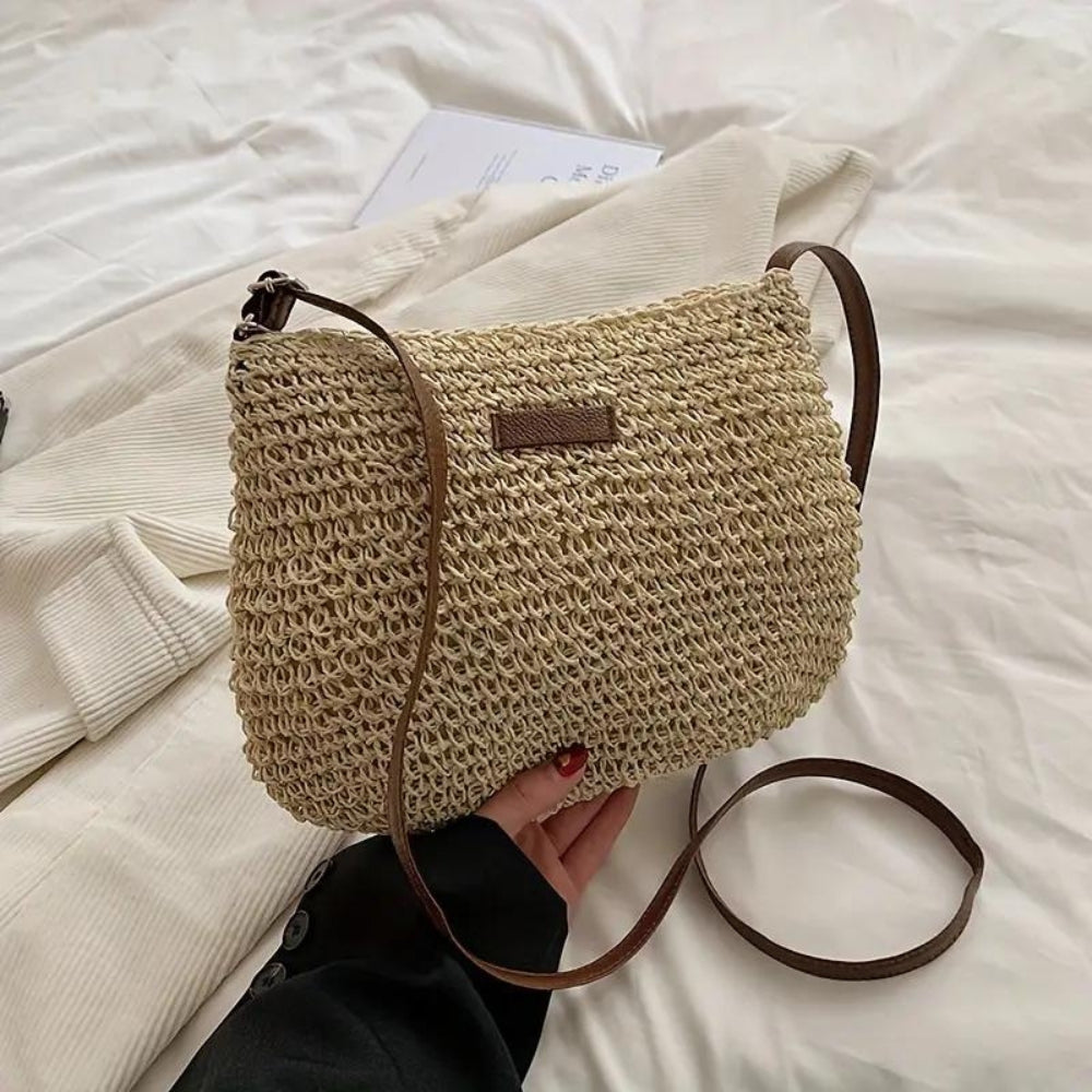 Borsa a spalla intrecciata donna, colore beige. Accessorio indispensabile per ogni guardaroba moda.