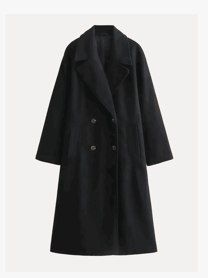 Cappotto donna lungo nero effetto lana, caldo e confortevole. Con revers classici e comode tasche frontali.
