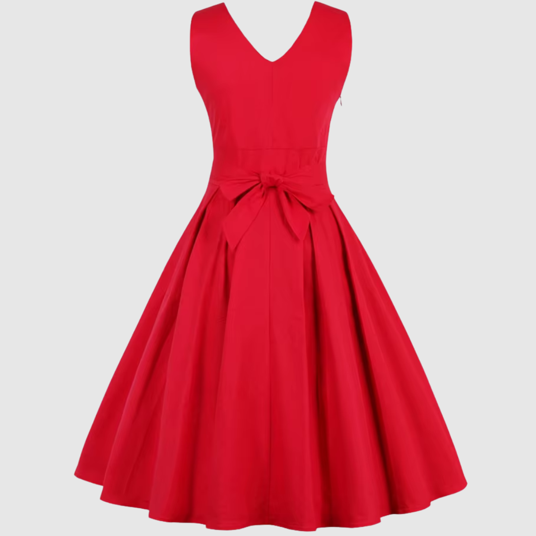 Moda donna: abito midi rosso plissettato, fluido e confortevole. Un look sofisticato e moderno per ogni occasione.