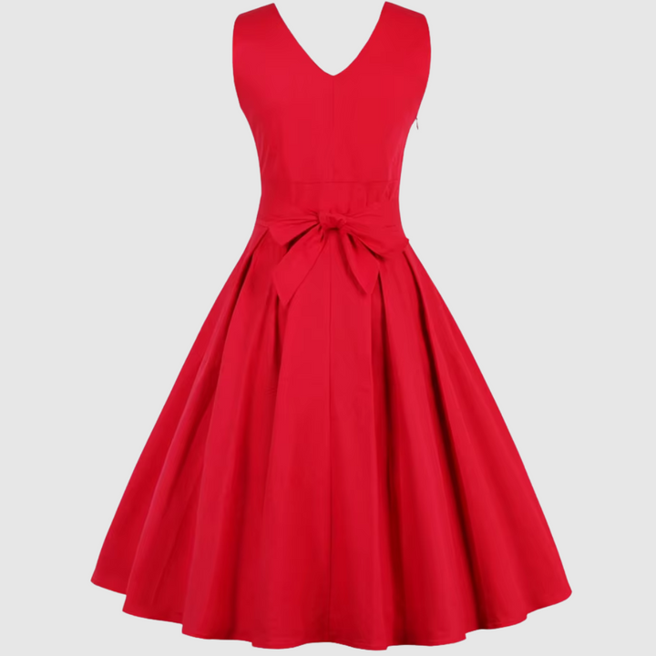 Moda donna: abito midi rosso plissettato, fluido e confortevole. Un look sofisticato e moderno per ogni occasione.