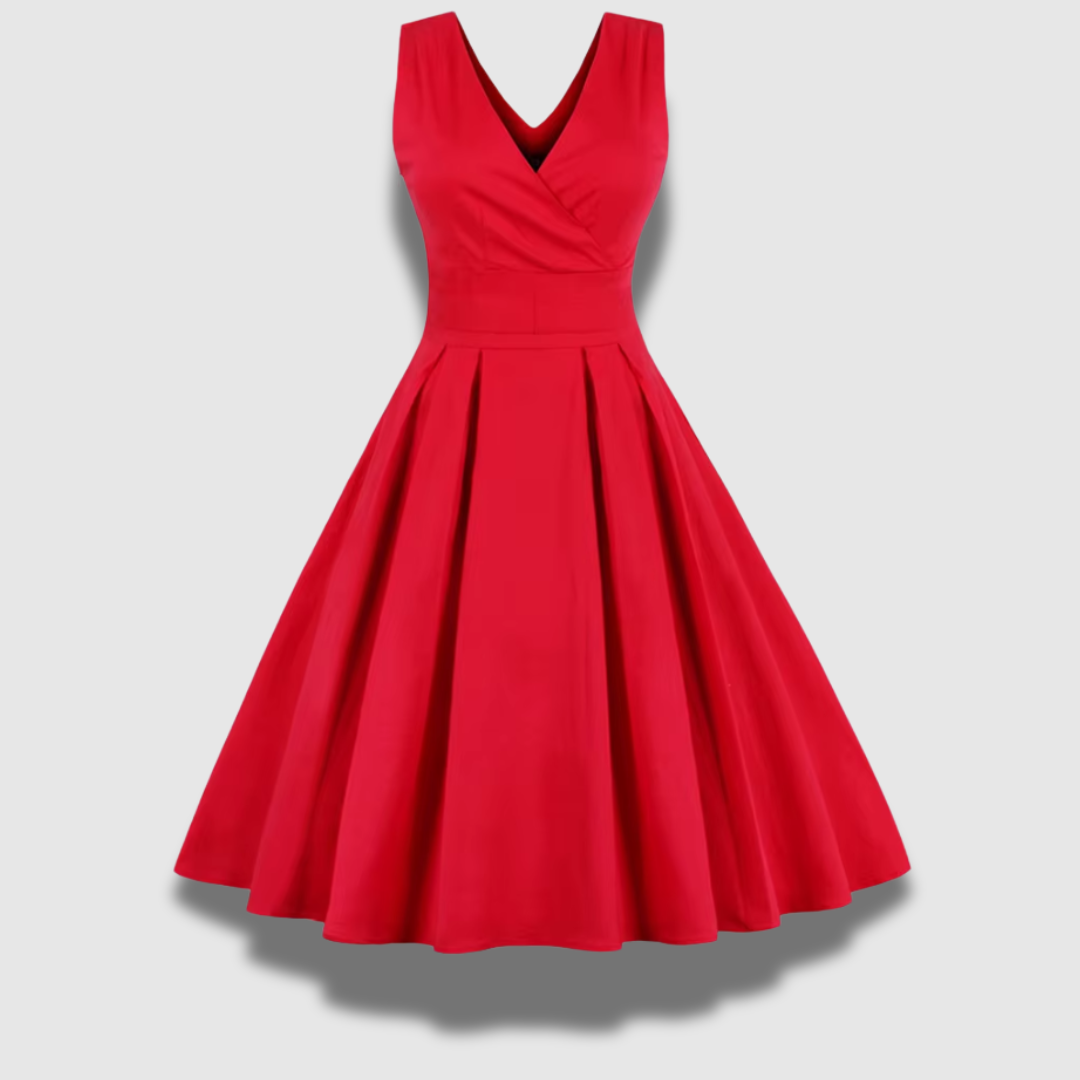 Vestito da sera midi plissettato rosso, senza maniche, che esalta l'eleganza femminile. Perfetto per eventi formali.