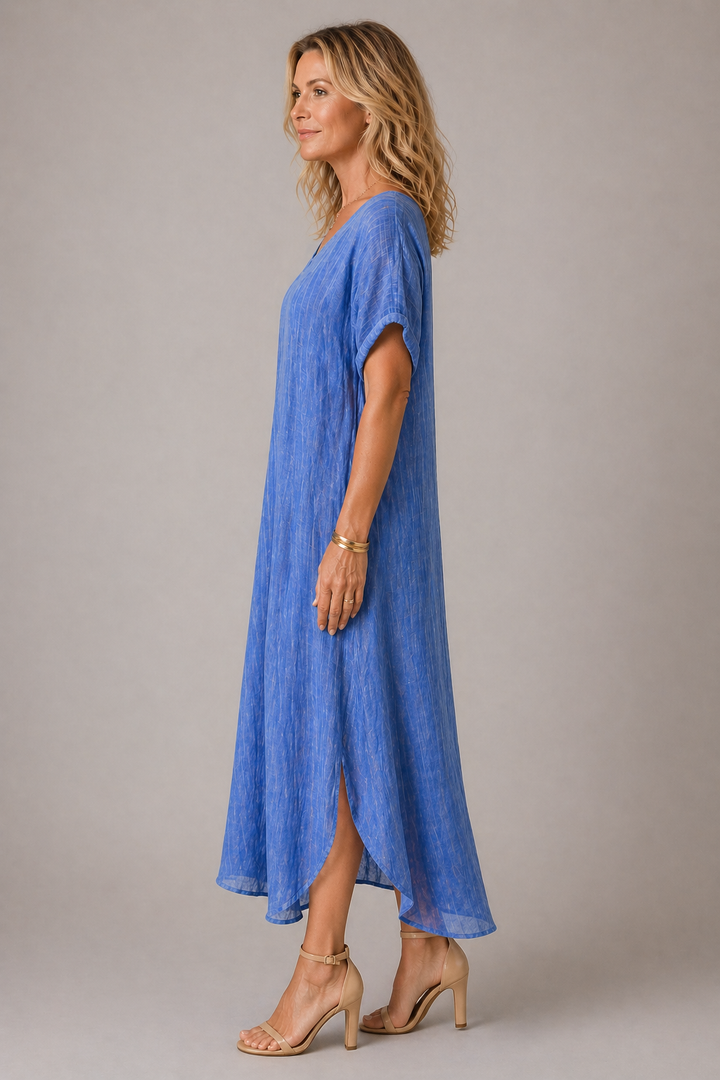 Abito donna blu casual a scollo V, stile fluido e confortevole per le tue giornate estive e viaggi rilassanti.