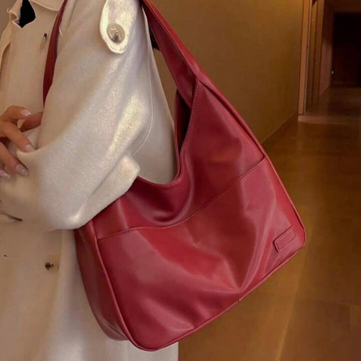Borsa donna in pelle premium, tracolla regolabile, ideale per l'ufficio e versatile.