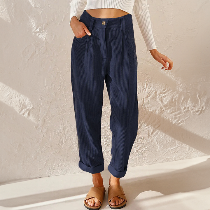 Pantaloni donna vita alta a coste con gamba larga, un capo versatile per look casual o eleganti.