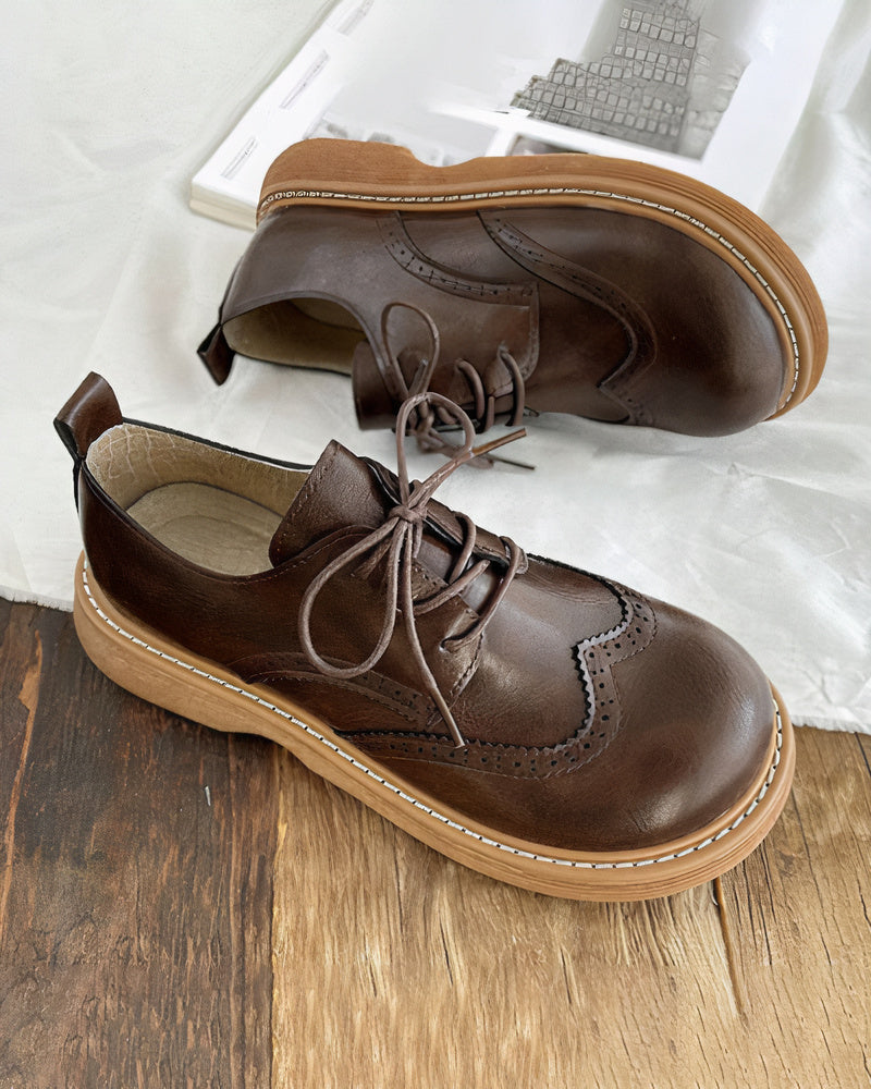 Scarpe Oxford retrò donna in pelle nera, eleganti e comode, perfette per look formali o casual quotidiani.