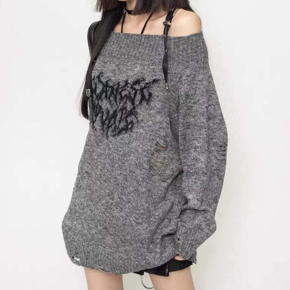 Maglione oversize da donna in morbida lana, ideale per un comfort elegante nelle giornate fredde autunnali.