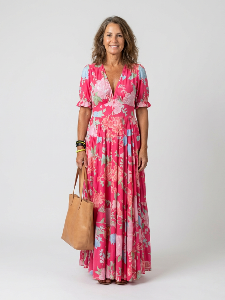 Abito midi floreale donna con scollo a V, tessuto leggero estivo. Ideale per look casual e vacanze.