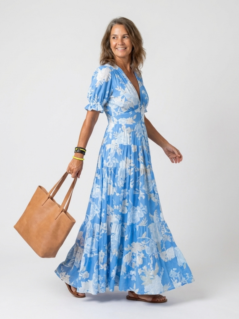 Elegante abito midi floreale da donna, scollo a V. Design fresco estivo con maniche corte, perfetto per ogni occasione.