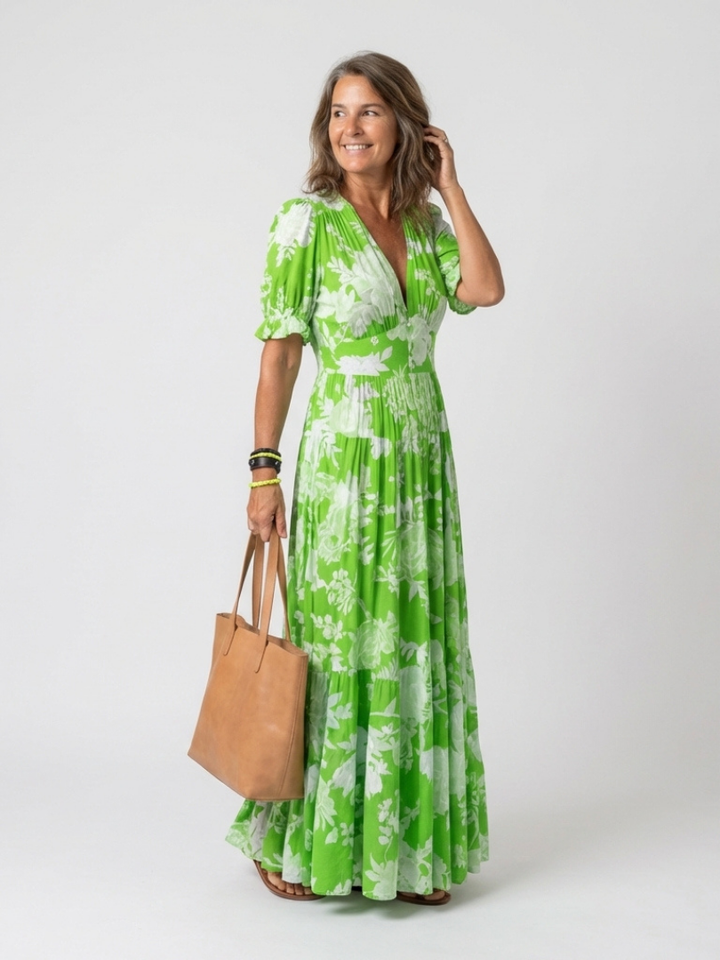 Abito midi floreale femminile per donna con scollo a V. Versatile per outfit estivi, dal casual al più chic.
