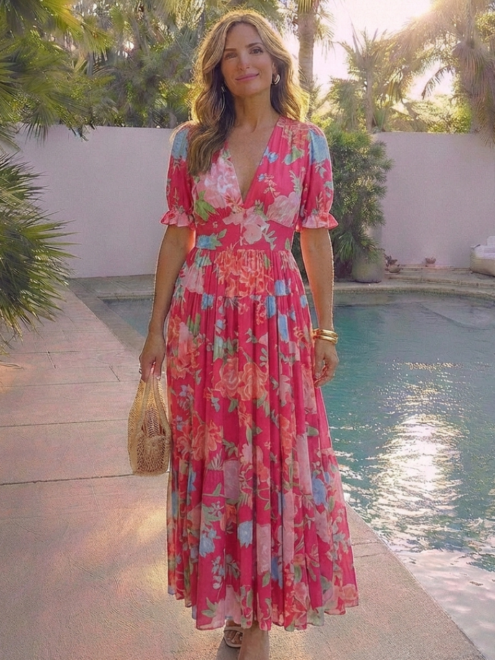 Abito midi estivo floreale da donna, scollo a V. Leggero, femminile e confortevole, perfetto per vacanze e tempo libero.