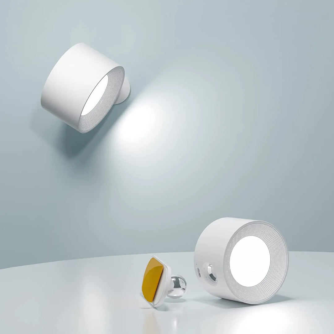 Lampada parete magnetica wireless, LED ricaricabile, design moderno 360° orientabile per illuminazione casa.