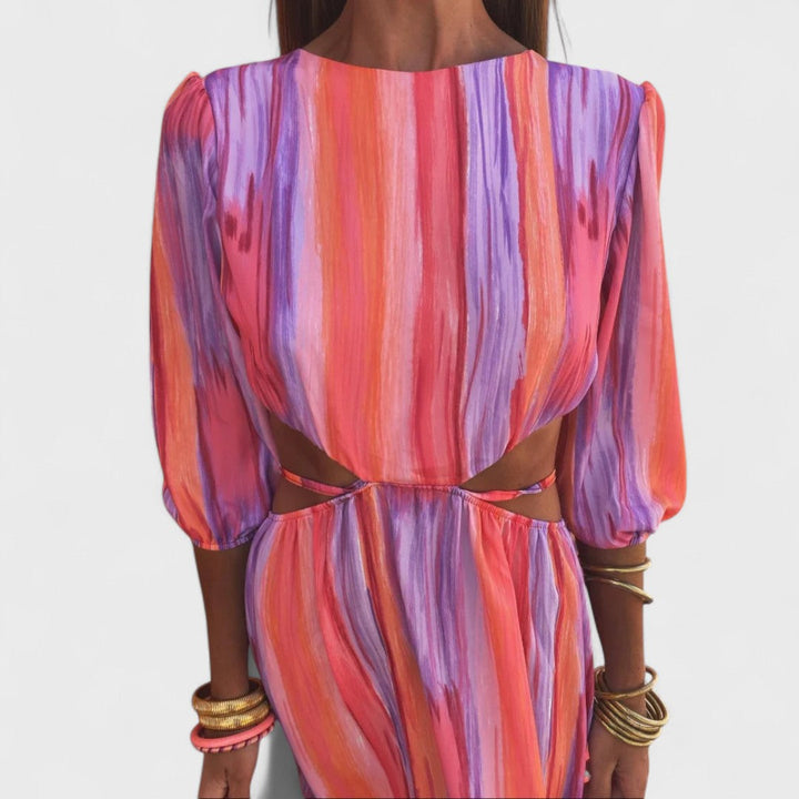 Elegante abito maxi da donna con taglio fluido, perfetto per l'estate, vacanze o serate speciali. Comodo e alla moda.