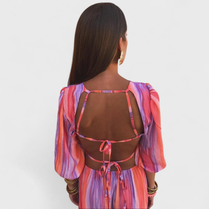 Abito estivo lungo da donna, look fluido e comodo. Ideale per uno stile casual chic o elegante per vacanze e tempo libero.