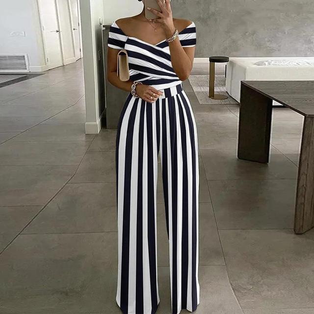 Jumpsuit donna off shoulder a scollo V con stampa vivace, ideale per look estivi.