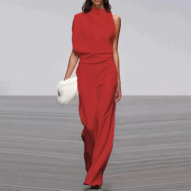 Tuta estiva da donna fluida, a figura intera, per un look raffinato e un comfort leggero sotto il sole.