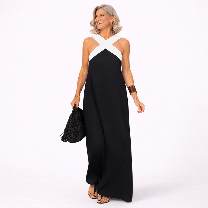 Abito estivo lungo da donna, elegante e fluido, con dettagli scollo incrociato per la moda estiva.