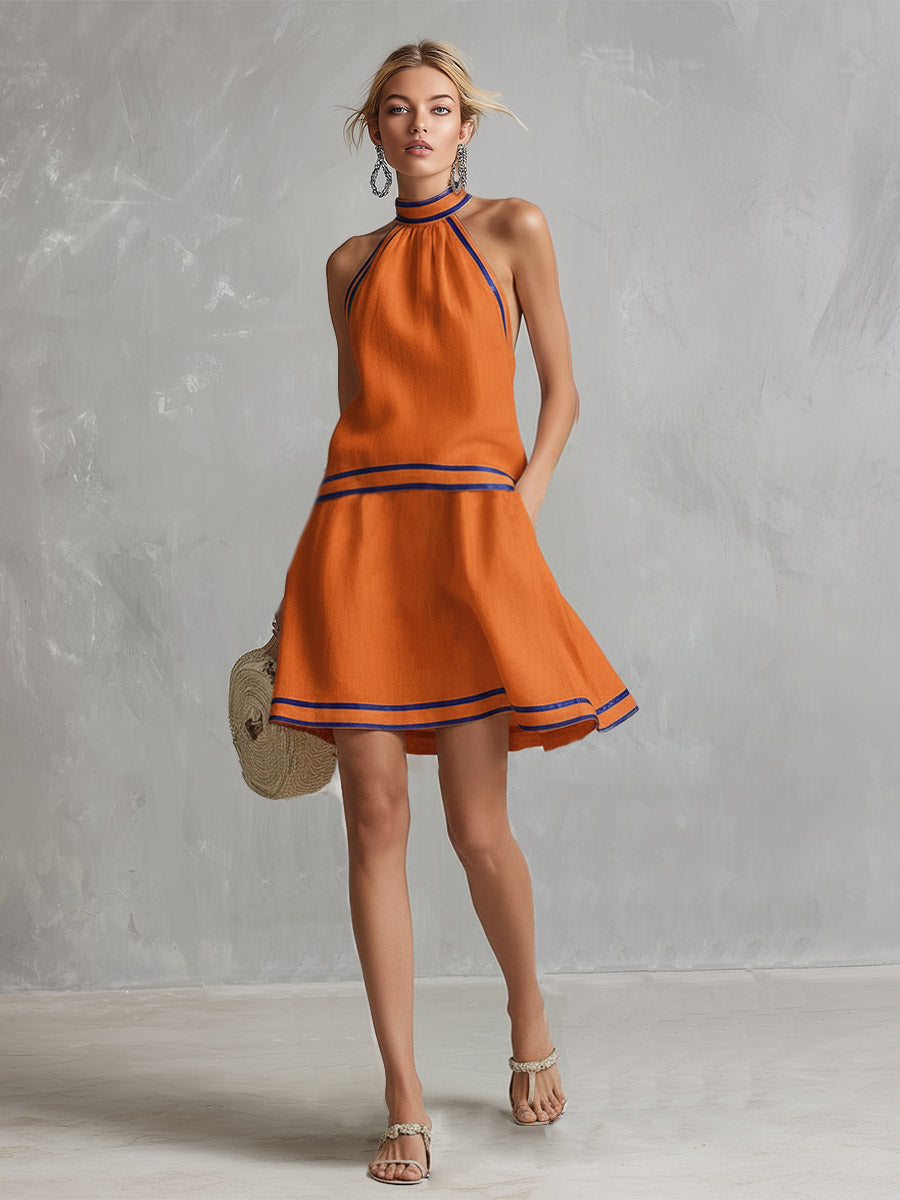 Senza maniche mini abito donna halter, silhouette svasata. Un must-have estivo per un look fresco ed elegante.