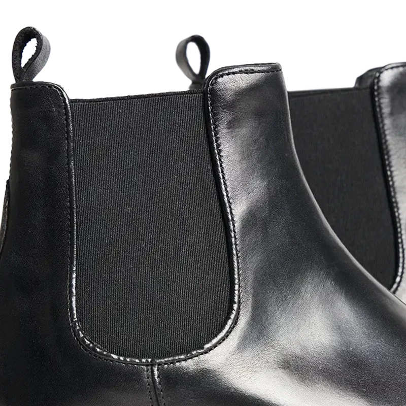 Calzature uomo: stivaletti Chelsea neri con rialzo interno di 7cm. Perfetti per un tocco di eleganza discreta.
