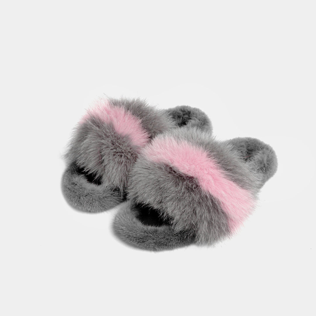Pantofole donna morbide grigio rosa in pelliccia, ideali per comfort e lusso a casa.