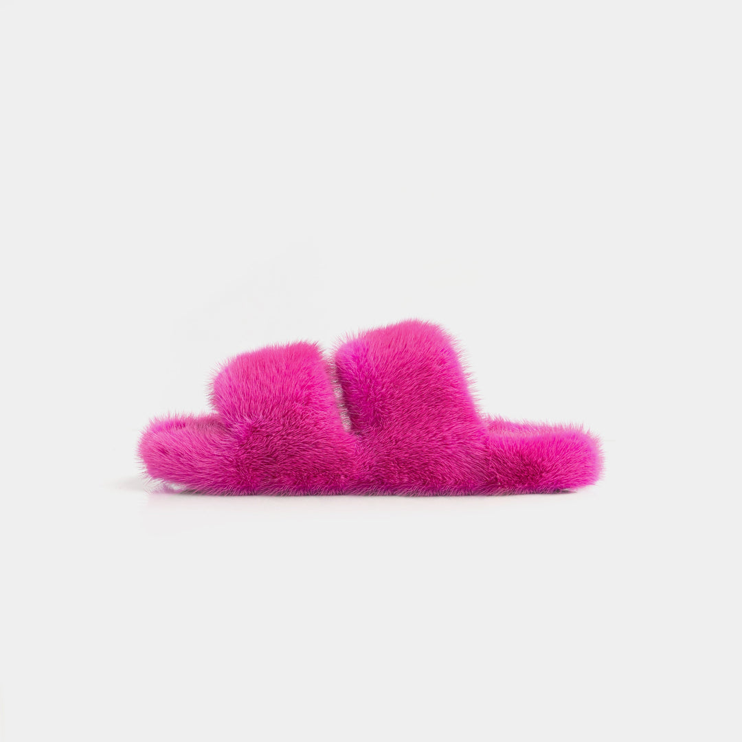 Pantofole donna in visone fucsia, estremamente morbide per un relax totale e comfort in casa.