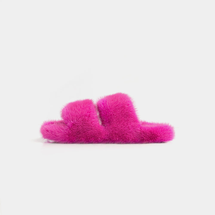 Pantofole donna in visone fucsia, estremamente morbide per un relax totale e comfort in casa.