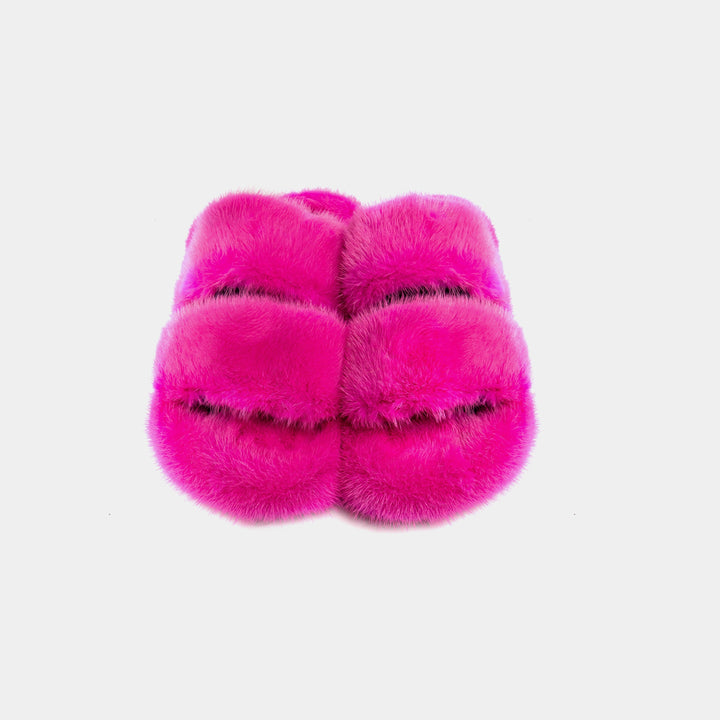Pantofole donna fucsia in visone, ultra morbide per coccolare i piedi con comfort e calore domestico.