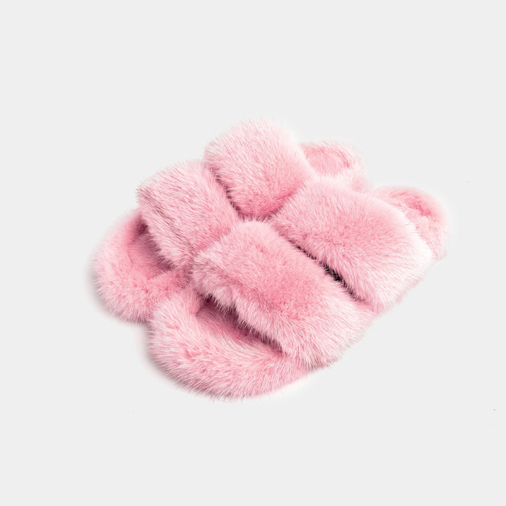 Pantofole donna rosa, morbide fasce in visone. Ideali per comfort e relax a casa.